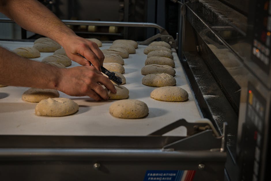 Close-up of dough preparation at an artisan bakery in Berlin, Germany, showcasing traditional bread making.